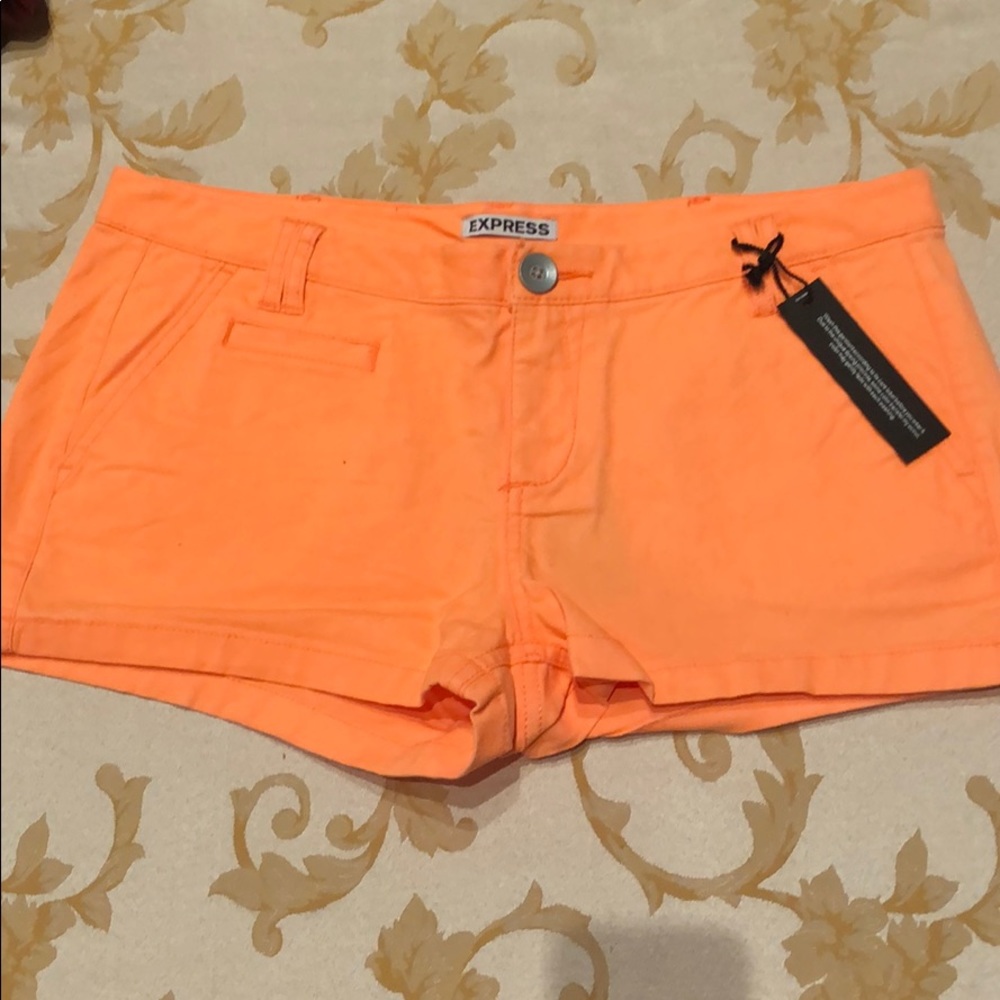 Express • neon orange shorts
